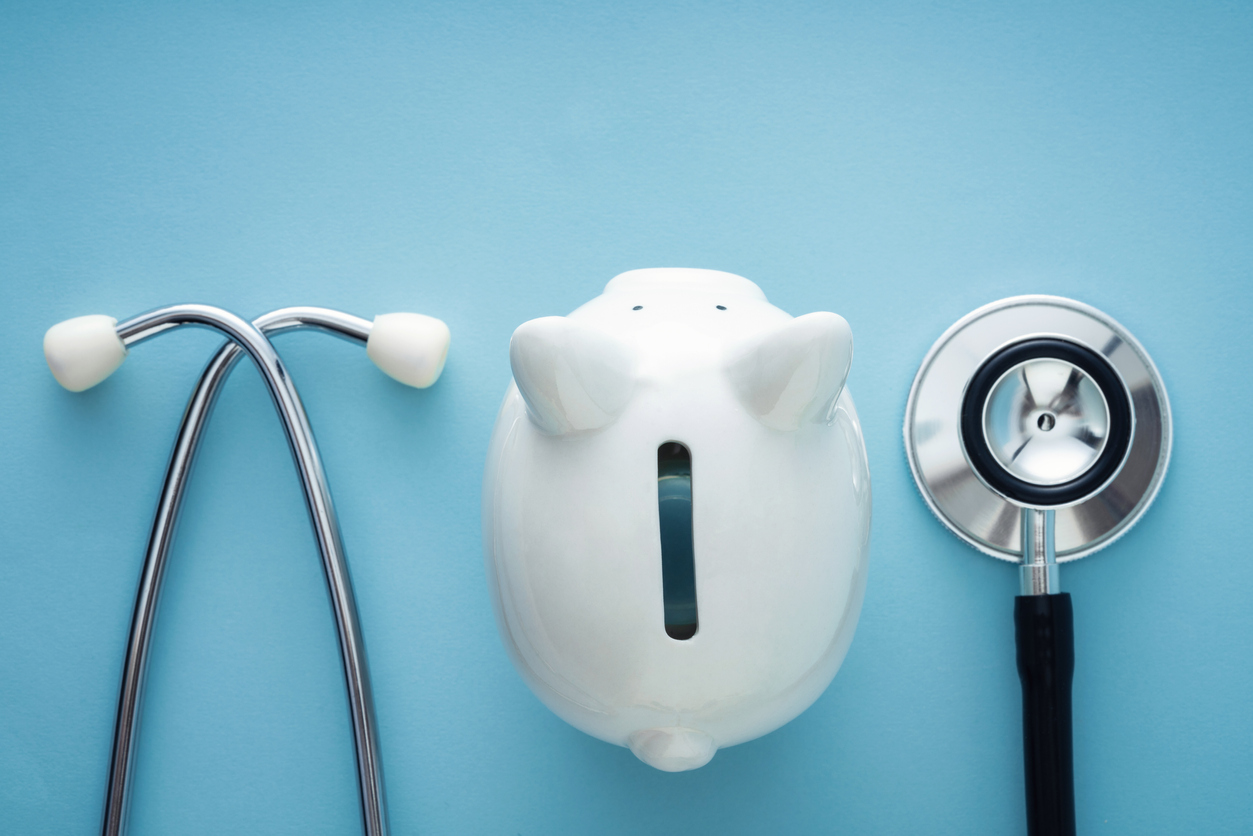 A graphic of a piggy bank and a stethoscope.